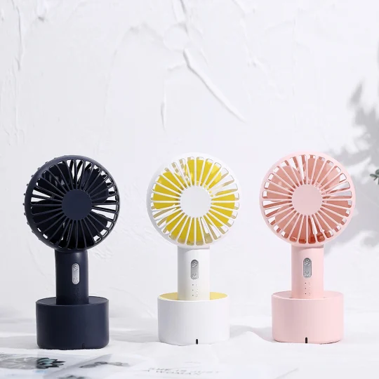 GXZ-F810  Hot sale new creative design table fan with 18650 recgargeable KC/PSE battery portable fan use charging base mini fan
